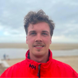 A head shot of Marius, a senior Sea Ranger. Marius is wearing a red Sea Ranger jacket.
